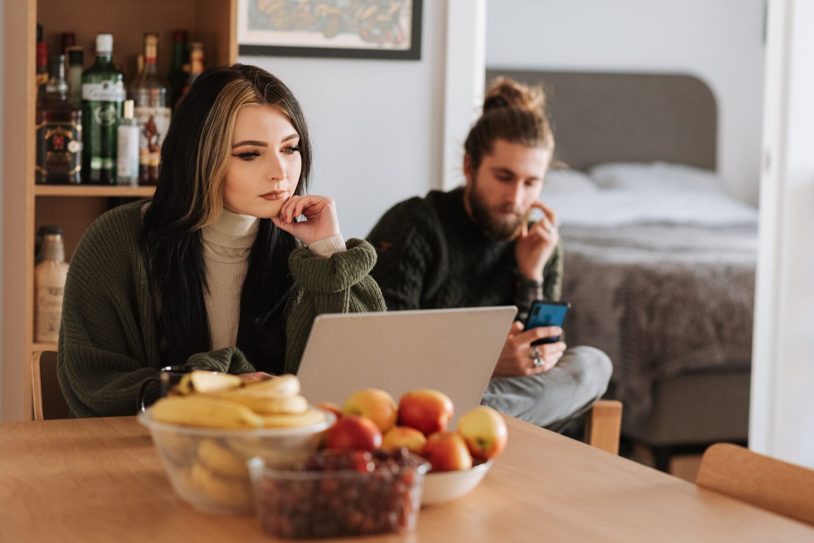 A couple shopping online at home